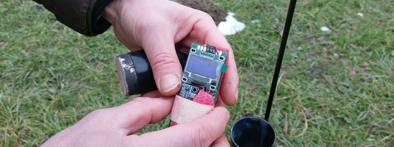 electronics pack being mounted into nose cone
