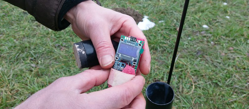 electronics pack being mounted into nose cone
